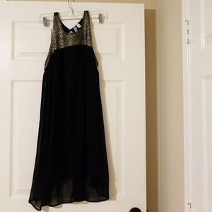 black with gold neck razor back dress